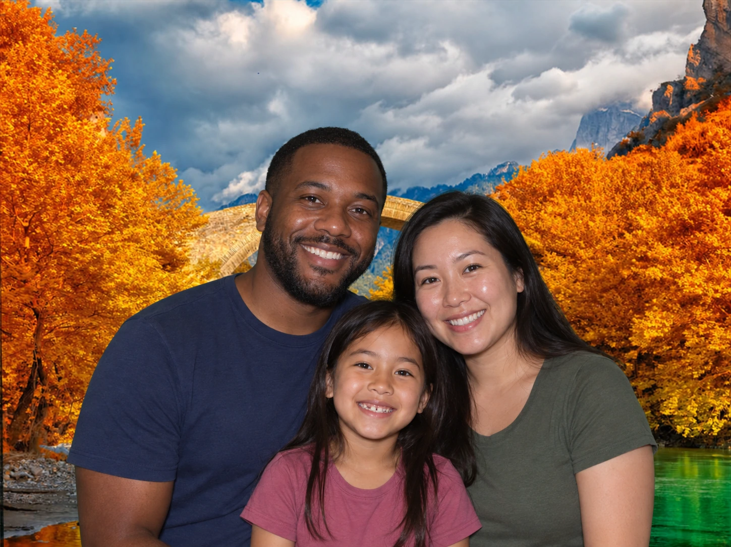 Family photographed with autumn scene background